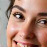Amélie Petit smiling after facial